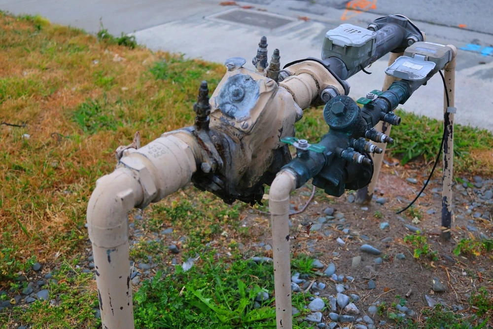 Backflow Prevention commercial water line leak repair plumbing city requirement outdoor leak prevention